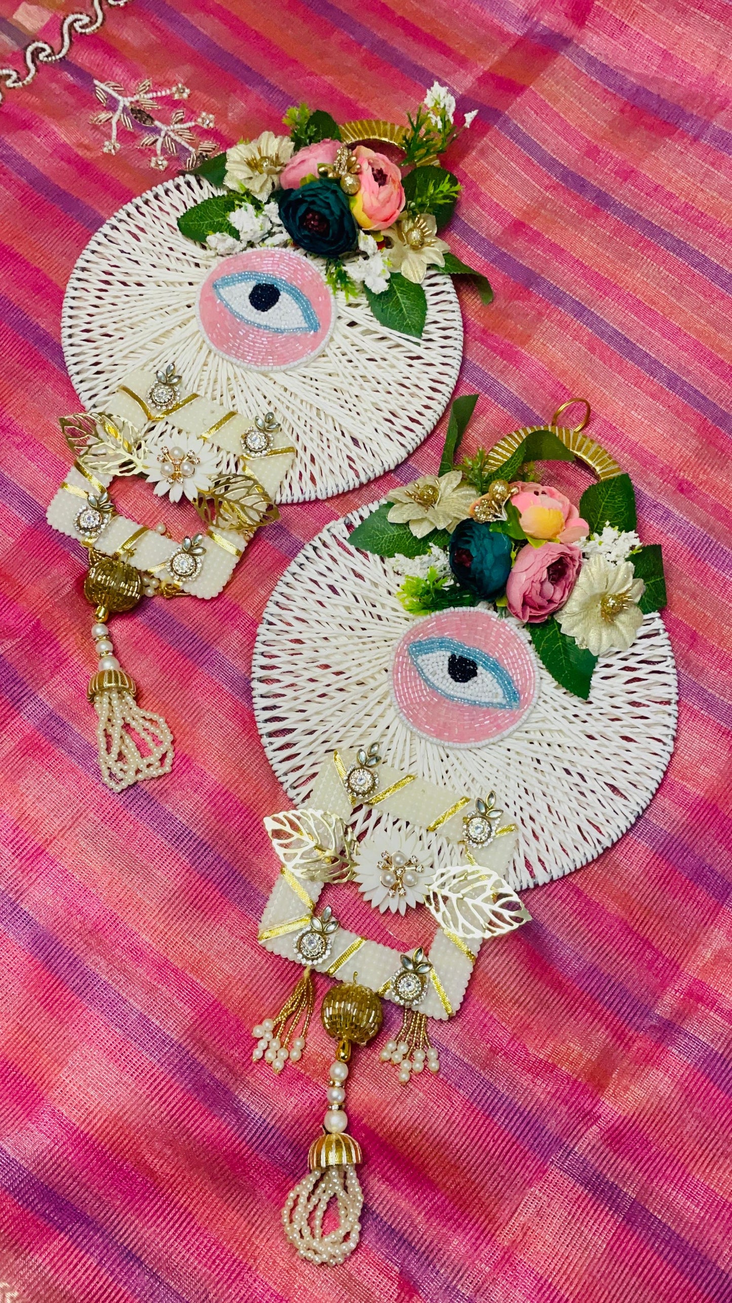 Pink evil eye hanging