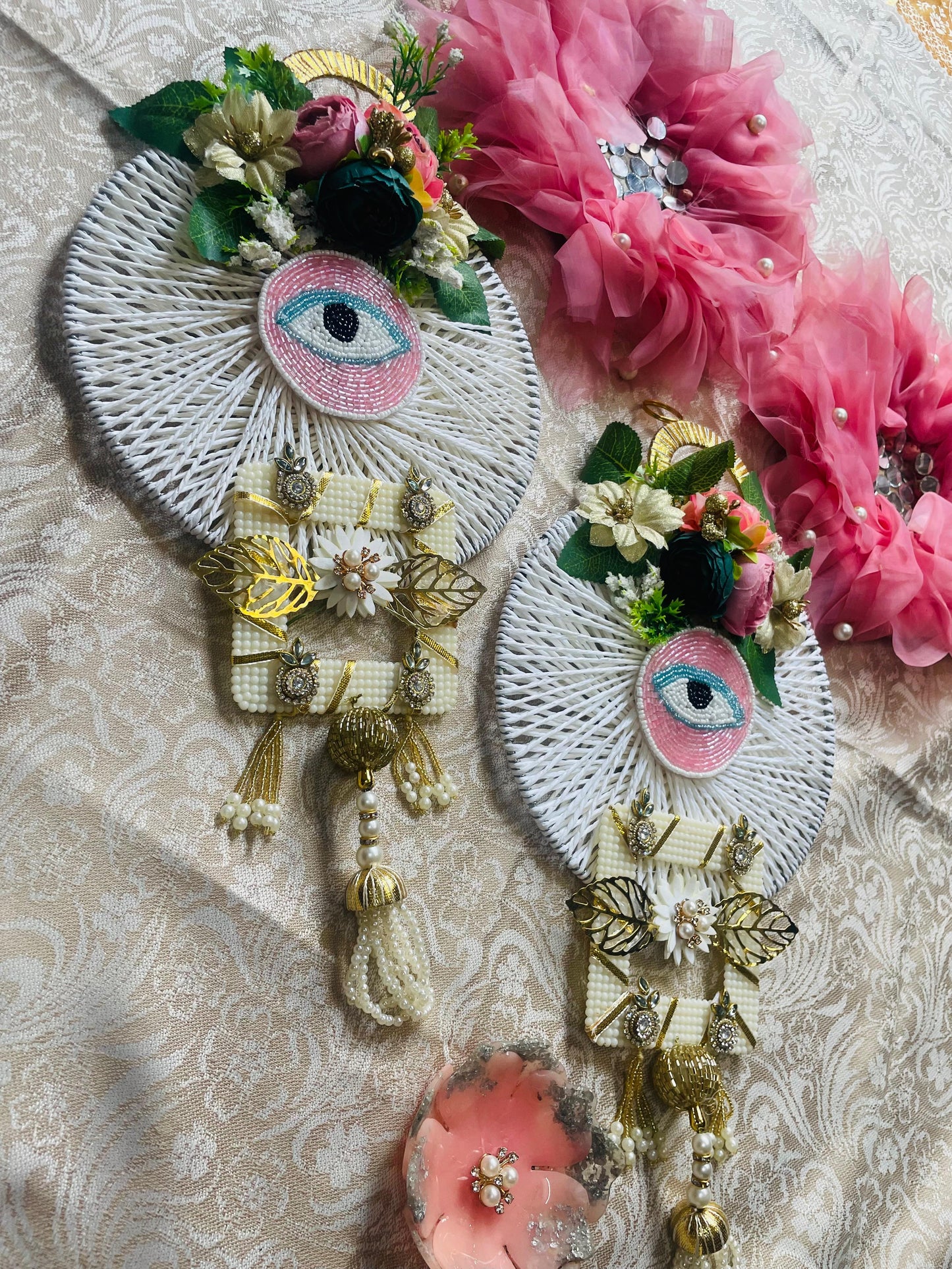 Pink evil eye hanging